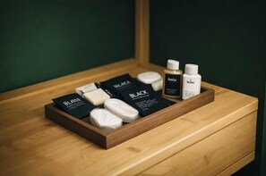 Hair dryer, towels, soap, shampoo