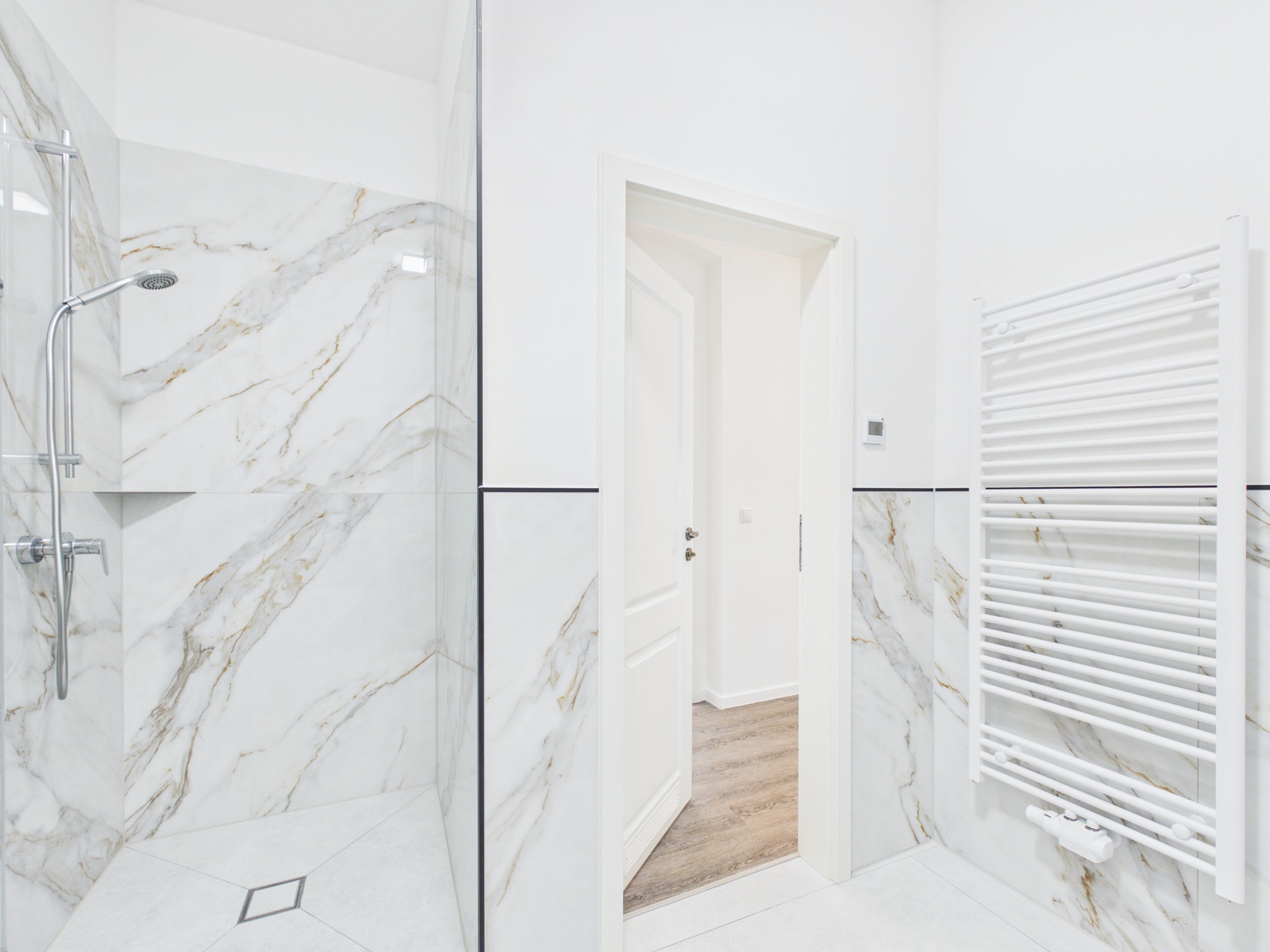 Shower, towels, soap, toilet paper