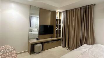 Economy Room, Balcony, City View | Desk, laptop workspace, free WiFi