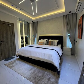 Family Room, Balcony, City View | Desk, laptop workspace, blackout drapes, soundproofing