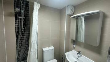 Shower, hair dryer, shampoo