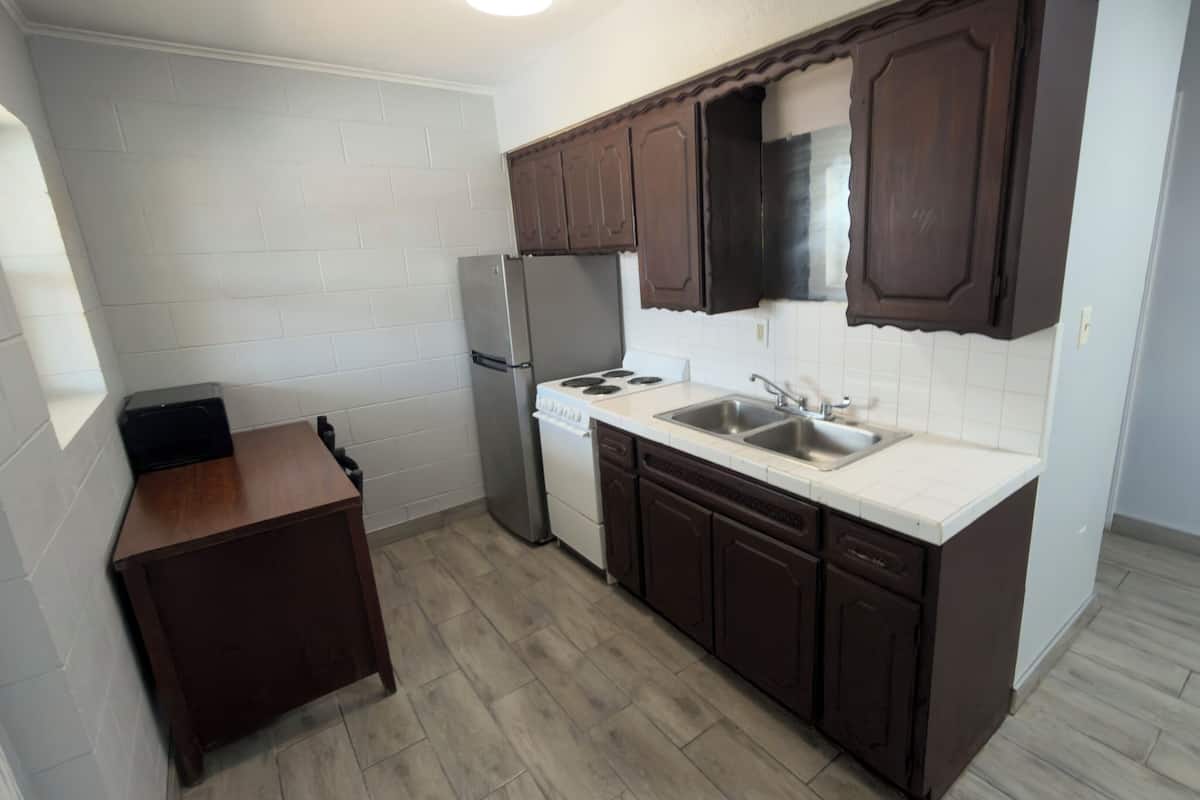 Deluxe Studio, 2 Queen Beds, Non Smoking, Kitchenette | Private kitchen | Full-sized fridge, microwave, oven, stovetop