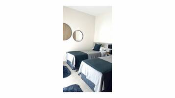 2 habitaciones, tabla de planchar con plancha, wifi y ropa de cama