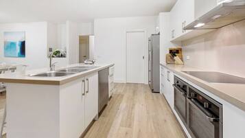 Fridge, coffee/tea maker, cookware/dishes/utensils