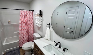 Hair dryer, towels, soap, shampoo