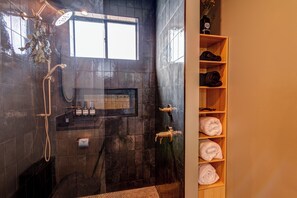 Shower, hair dryer, towels, soap