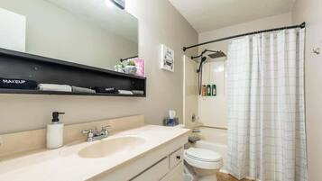 Shower, hair dryer, shampoo