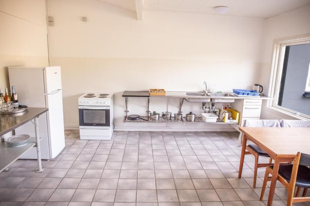 Full-size fridge, oven, highchair, cookware/dishes/utensils