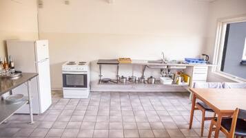 Full-size fridge, oven, highchair, cookware/dishes/utensils