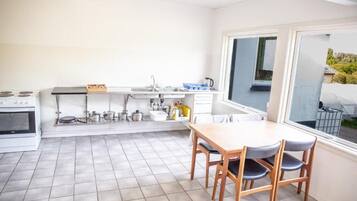 Full-sized fridge, oven, high chair, cookware/dishes/utensils
