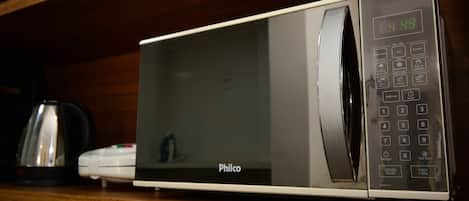 A microwave oven with a digital display, a keypad, and the brand name 'Philco' on the front.