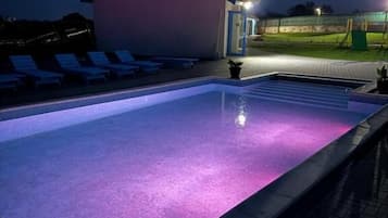 Seasonal outdoor pool, open 8:00 AM to 8:00 PM, pool umbrellas