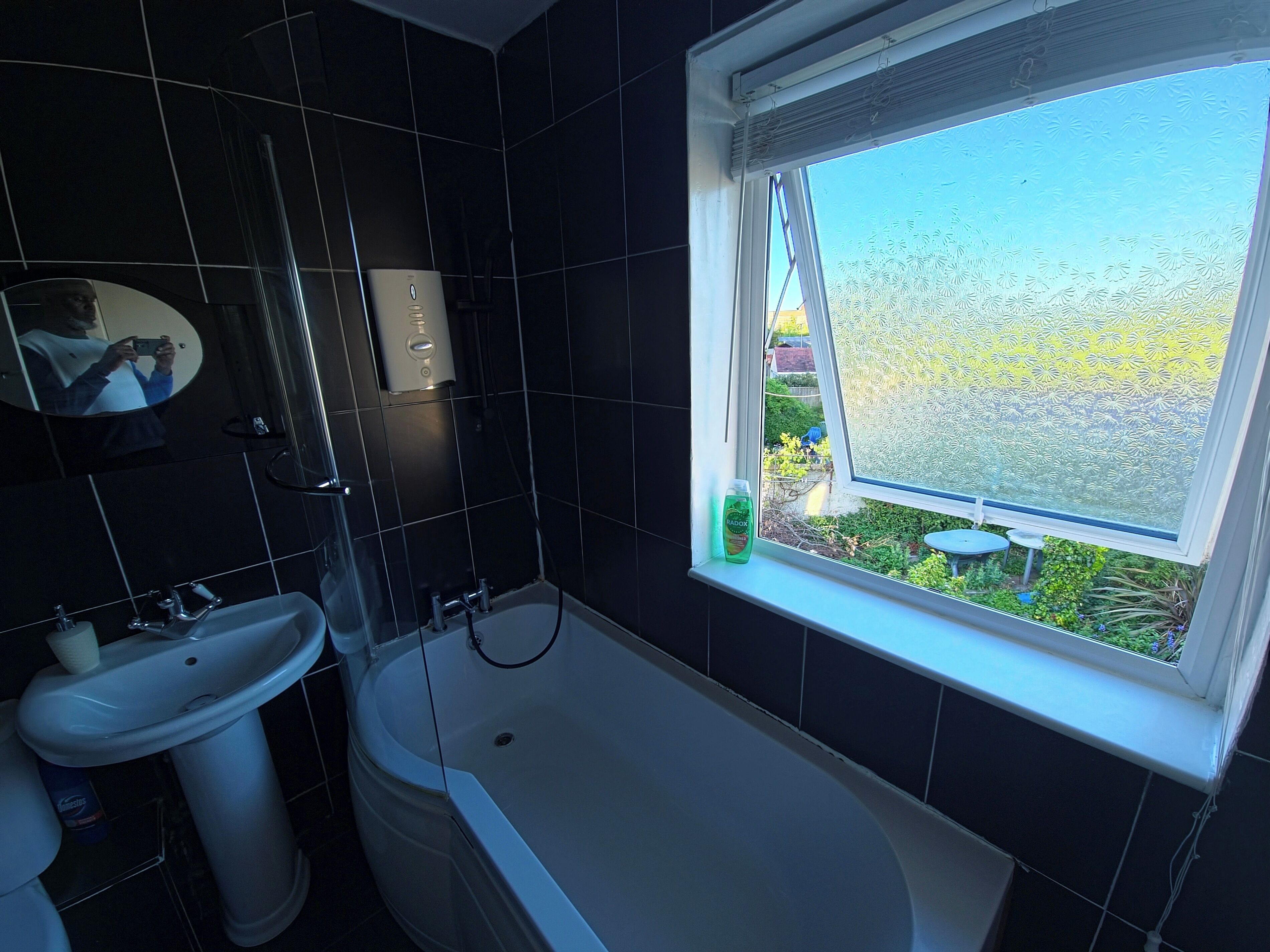 Separate tub and shower, deep soaking tub, towels