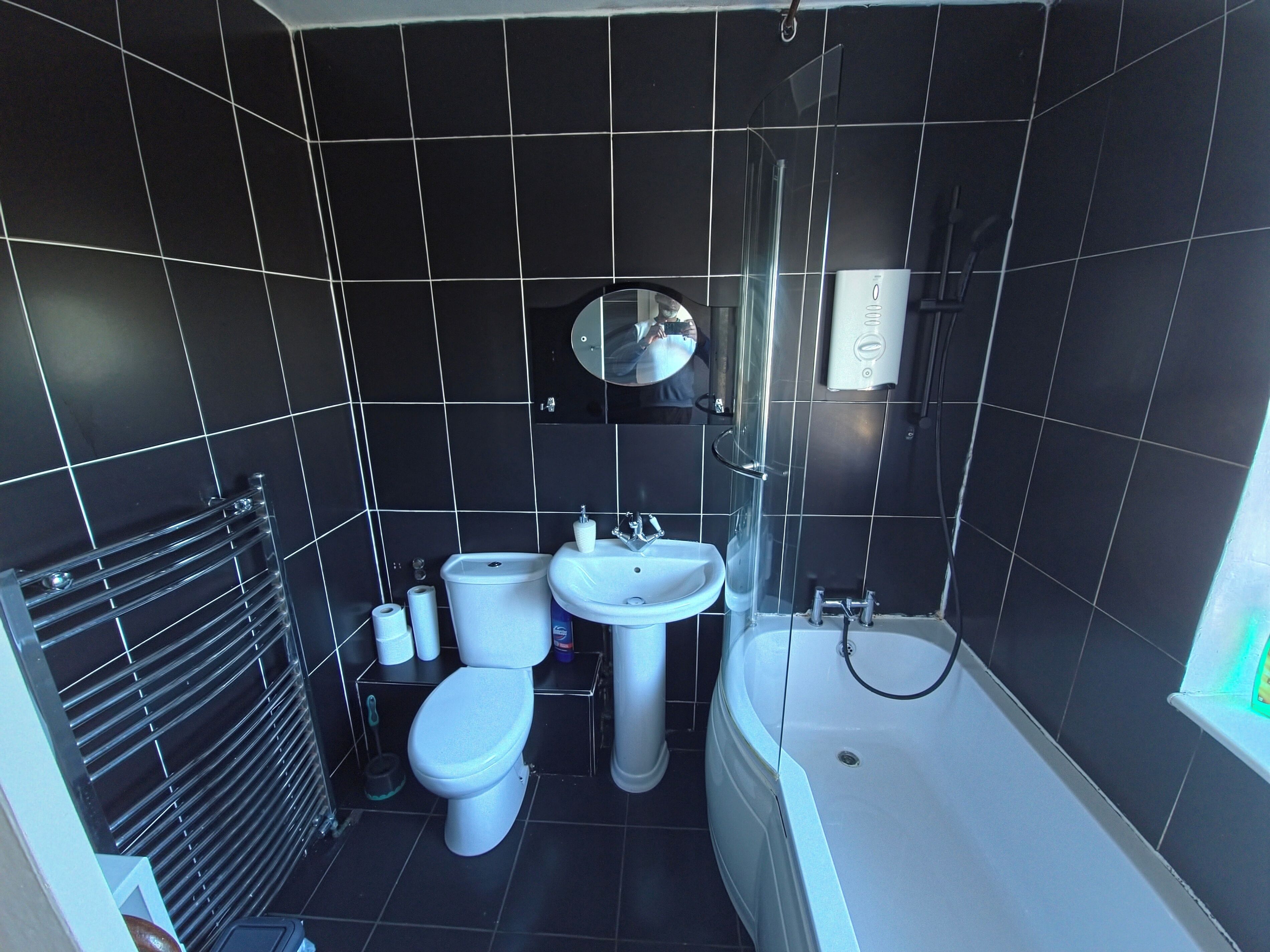 Separate tub and shower, deep soaking tub, towels