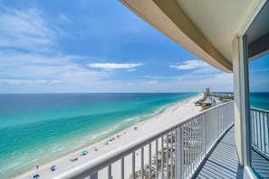 A balcony with a view of a beach and ocean. - Palazzo 908 (Panama City Beach)