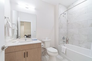 Hair dryer, towels, soap, toilet paper