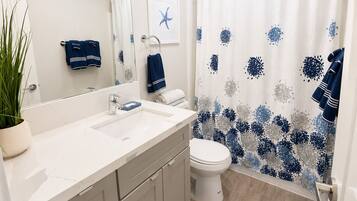 Hair dryer, towels, toilet paper