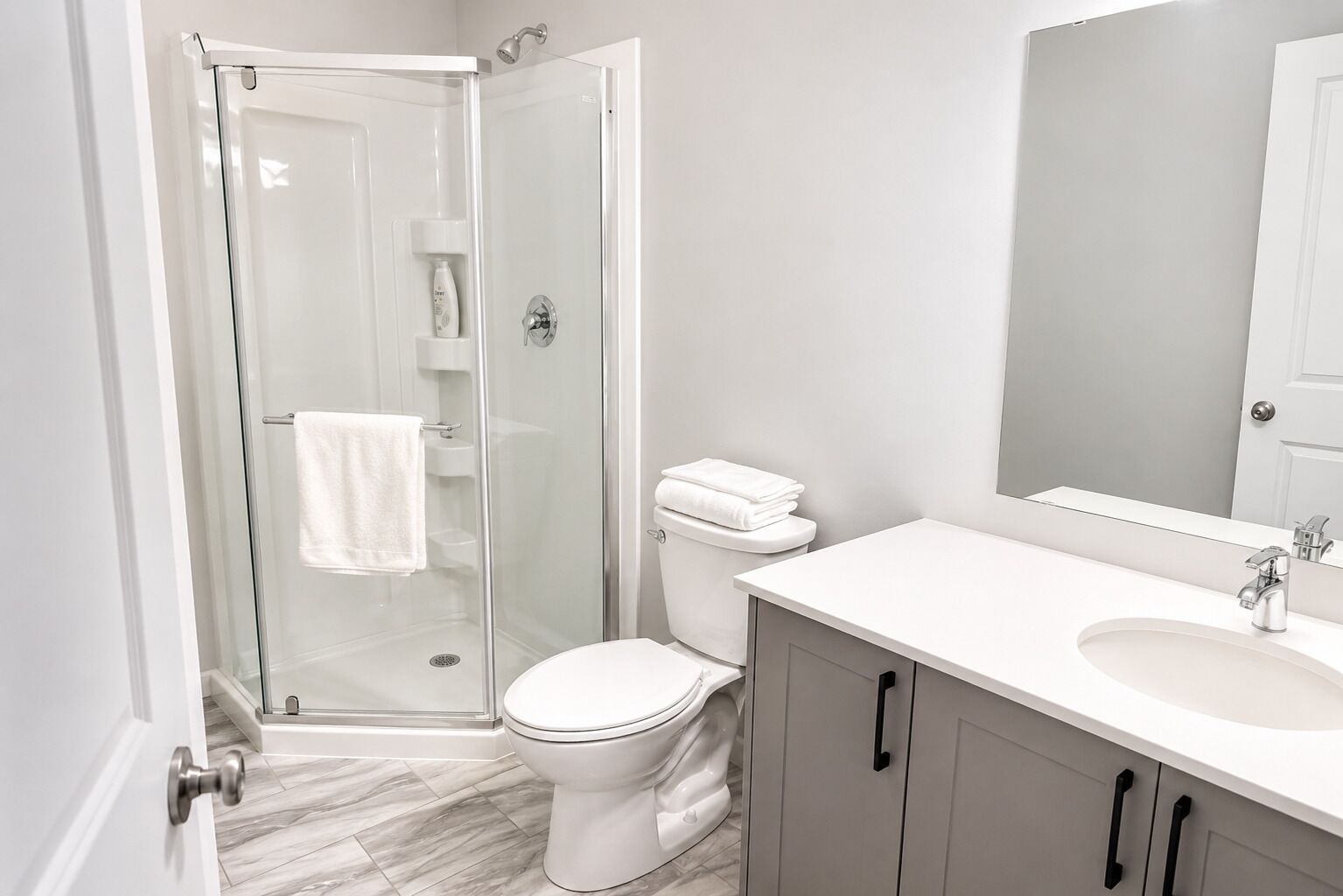 Shower, towels, toilet paper