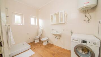 Shower, free toiletries, towels, soap