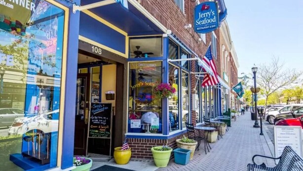 A brick building with a restaurant named 'Jerry's Seafood' on the ground floor. - 2 Story Townhome-Walk to Downtown Lewes! (Lewes)