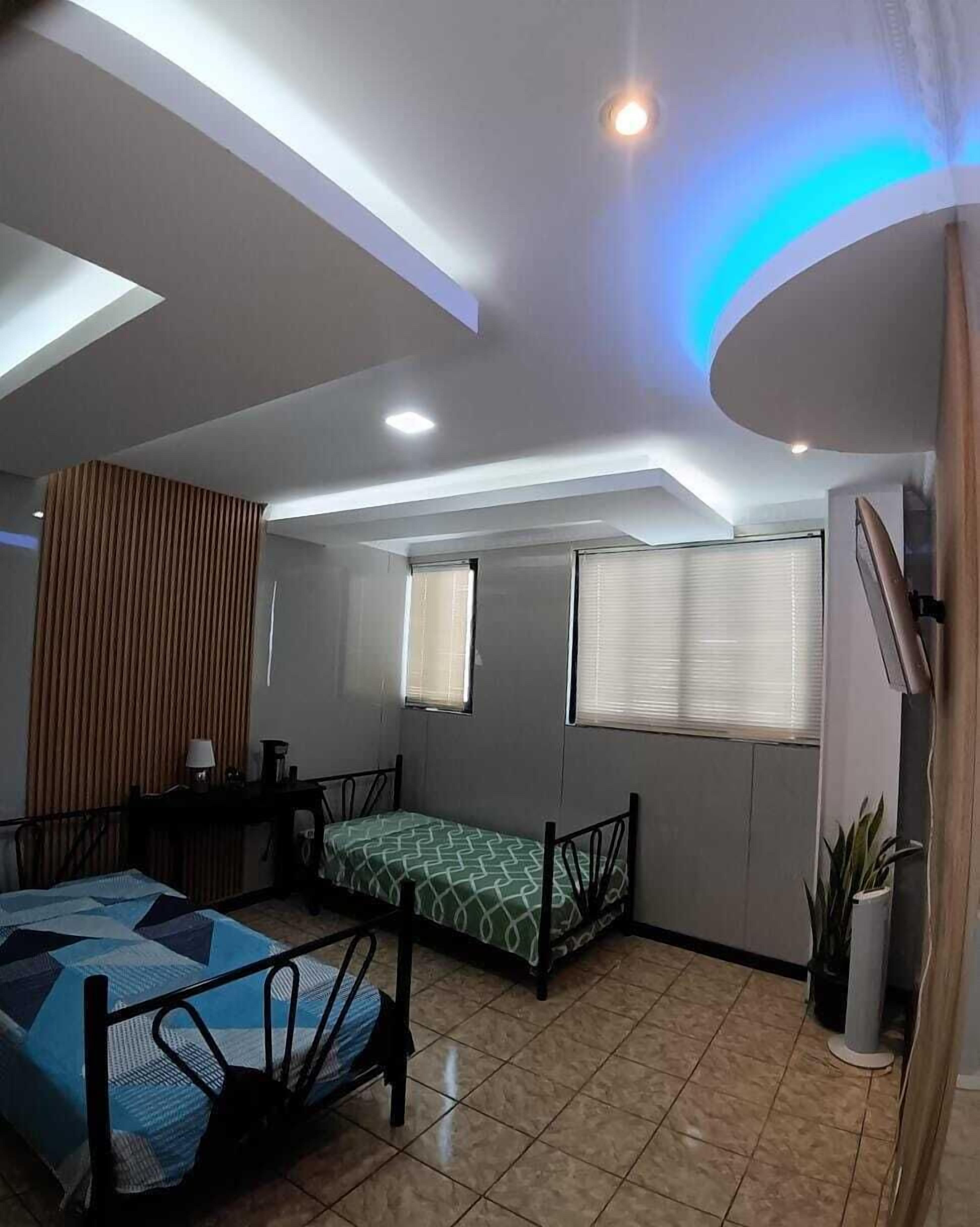 Chambre Deluxe avec lits jumeaux, 2 lits jumeaux, vue sur la ville | Accès au Wi-Fi (inclus), literie fournie