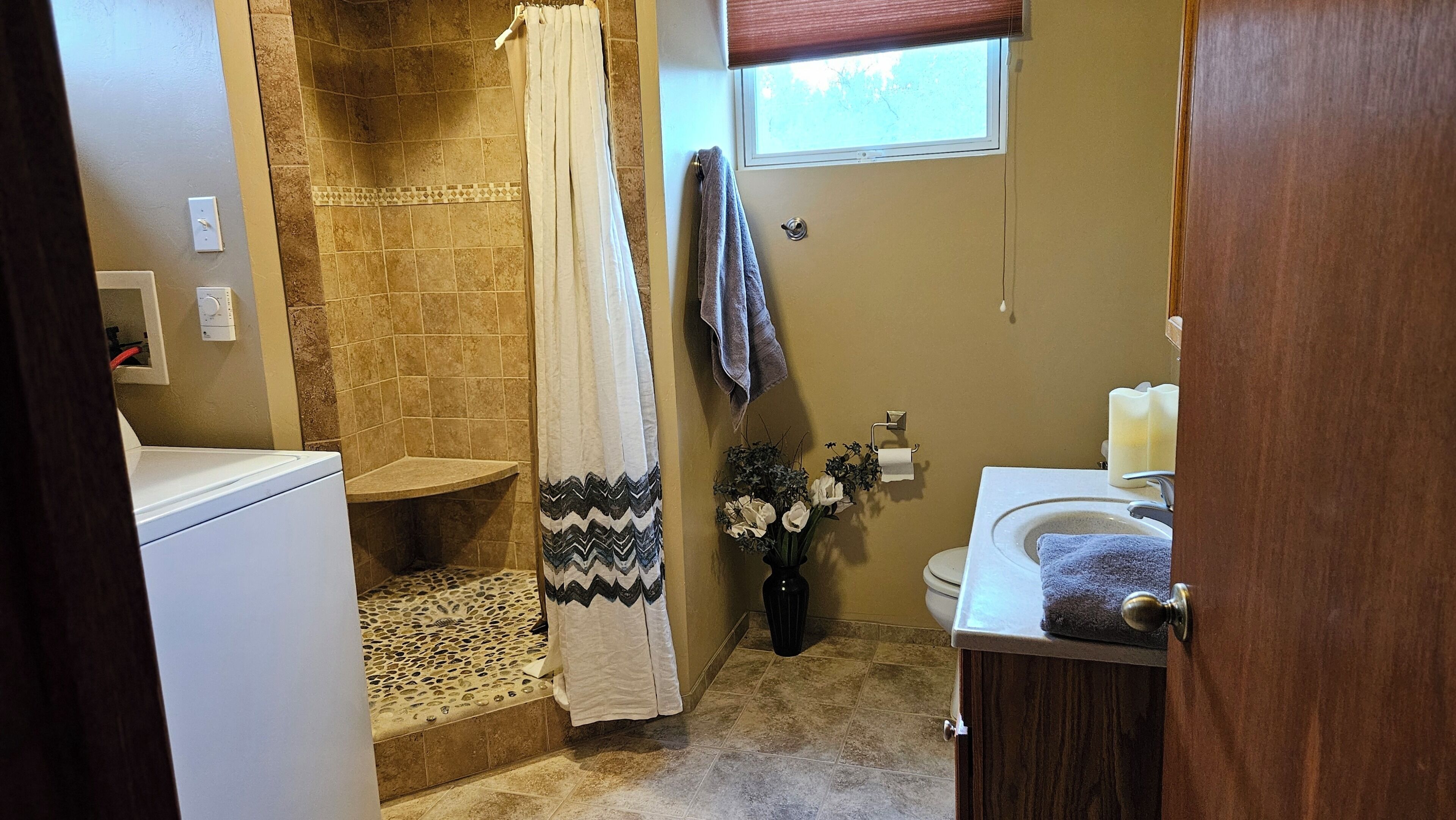 Shower, towels, soap, toilet paper