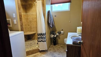 Shower, towels, soap, toilet paper