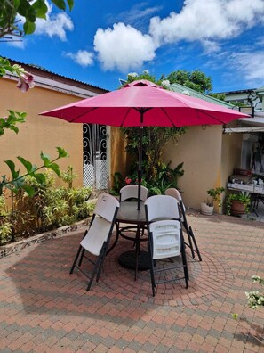 Outdoor dining - Cozy, convenient and secured studio-Located Almond Grove Cole bay. (Cole Bay)