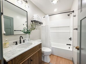 Hair dryer, towels, soap, shampoo