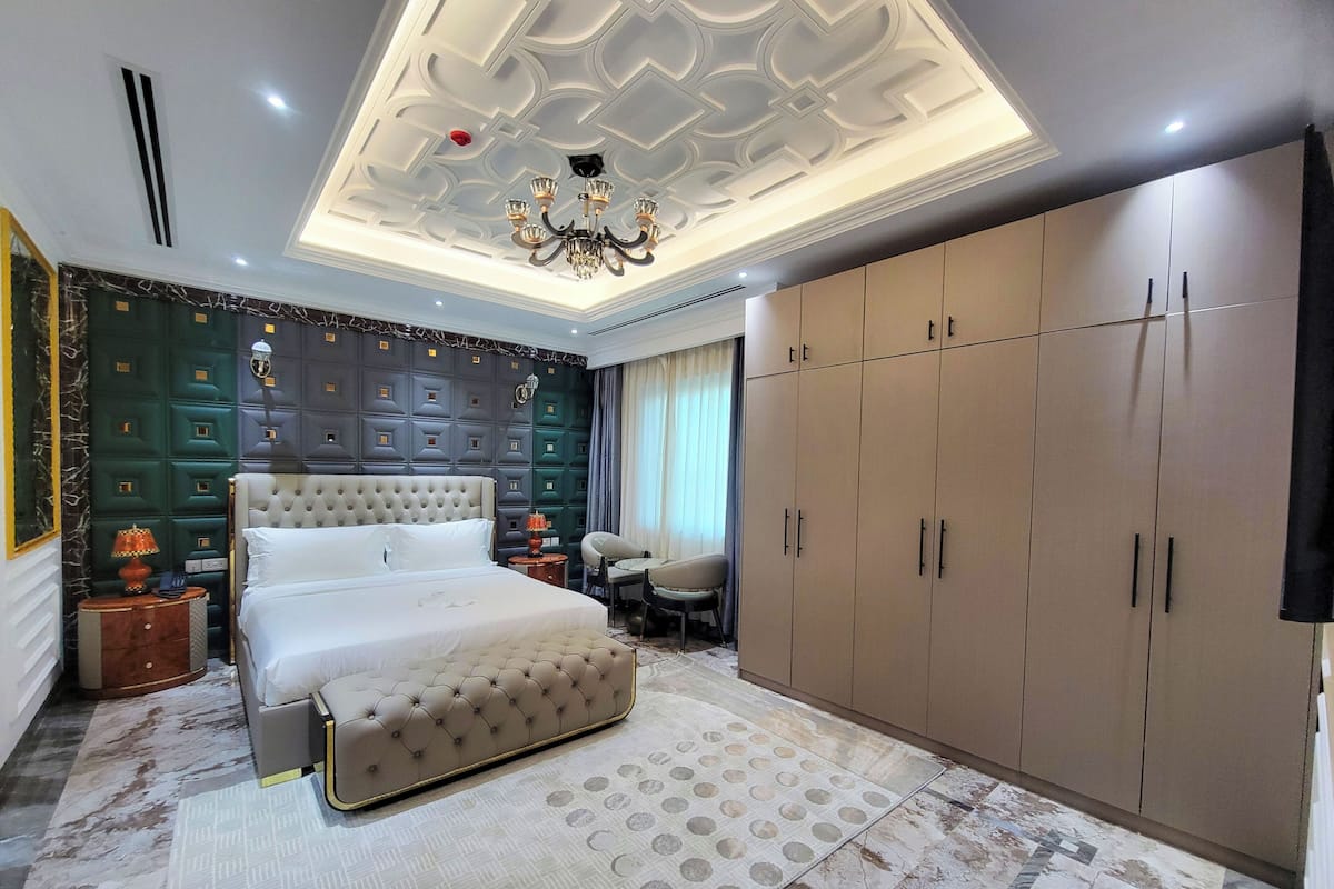 Luxury Suite, Balcony, Hill View | In-room safe, desk, laptop workspace, blackout drapes