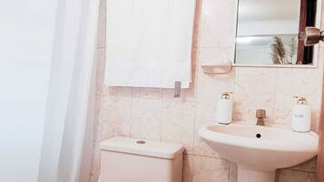 Eco-friendly toiletries, towels, soap, shampoo