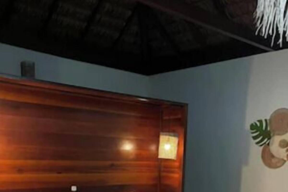 Economy Chalet, Lanai, Garden View | Laptop workspace, iron/ironing board (on request), bed sheets