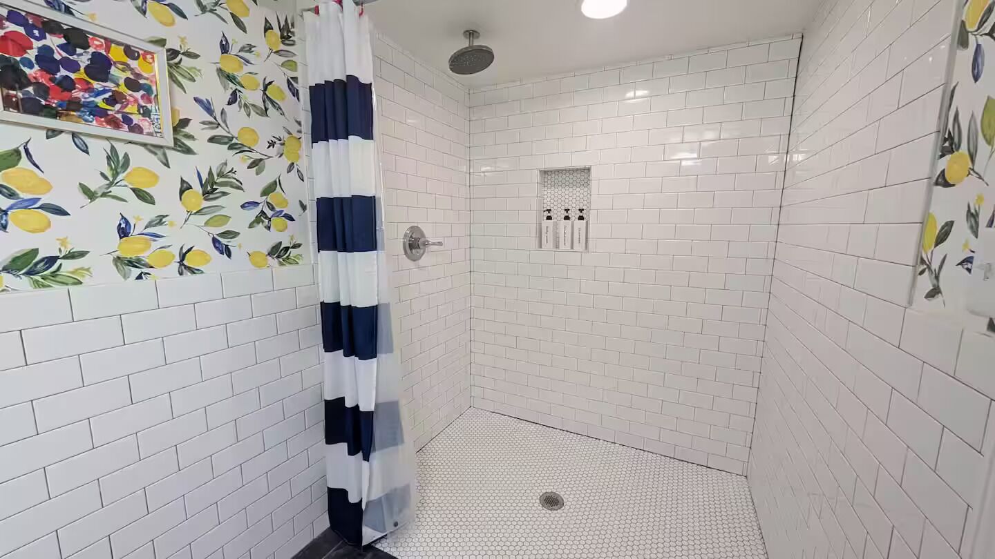 Shower, towels, soap, toilet paper