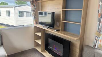 Fernseher, Kamin
