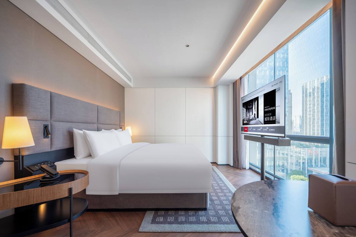 Kamar Double Eksekutif untuk 1 Orang | Seprai premium, selimut bulu angsa, busa memori, dan minibar gratis