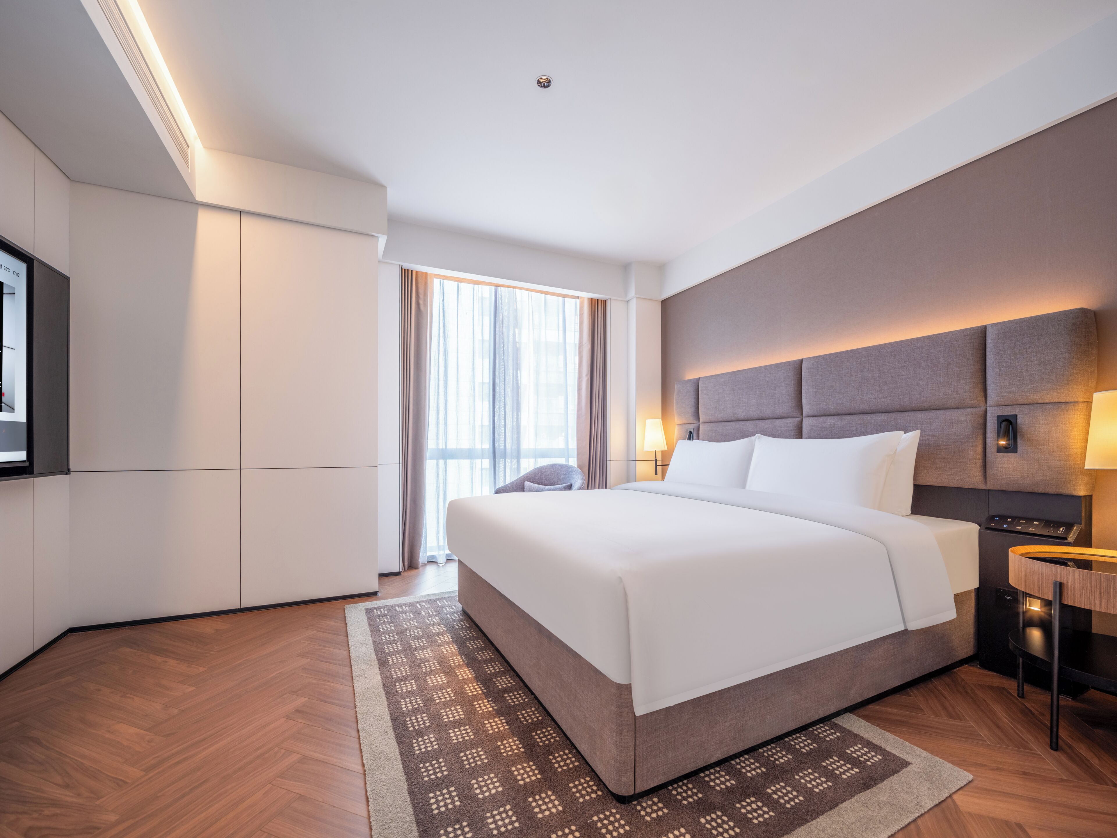 Deluxe Suite, City View | Desk, laptop workspace, blackout curtains, soundproofing