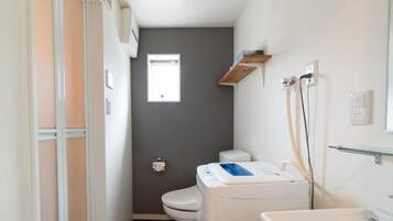 Economy Apartment, 1 Double Bed, Private Bathroom | Bathroom | Separate tub and shower, hair dryer, slippers, bidet