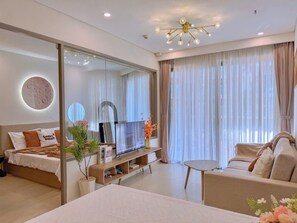 Family Apartment, Balcony | Living area | 40-inch Smart TV with digital channels - Lisa House - The Sóng Condotel Vũng Tàu  (Vũng Tàu)