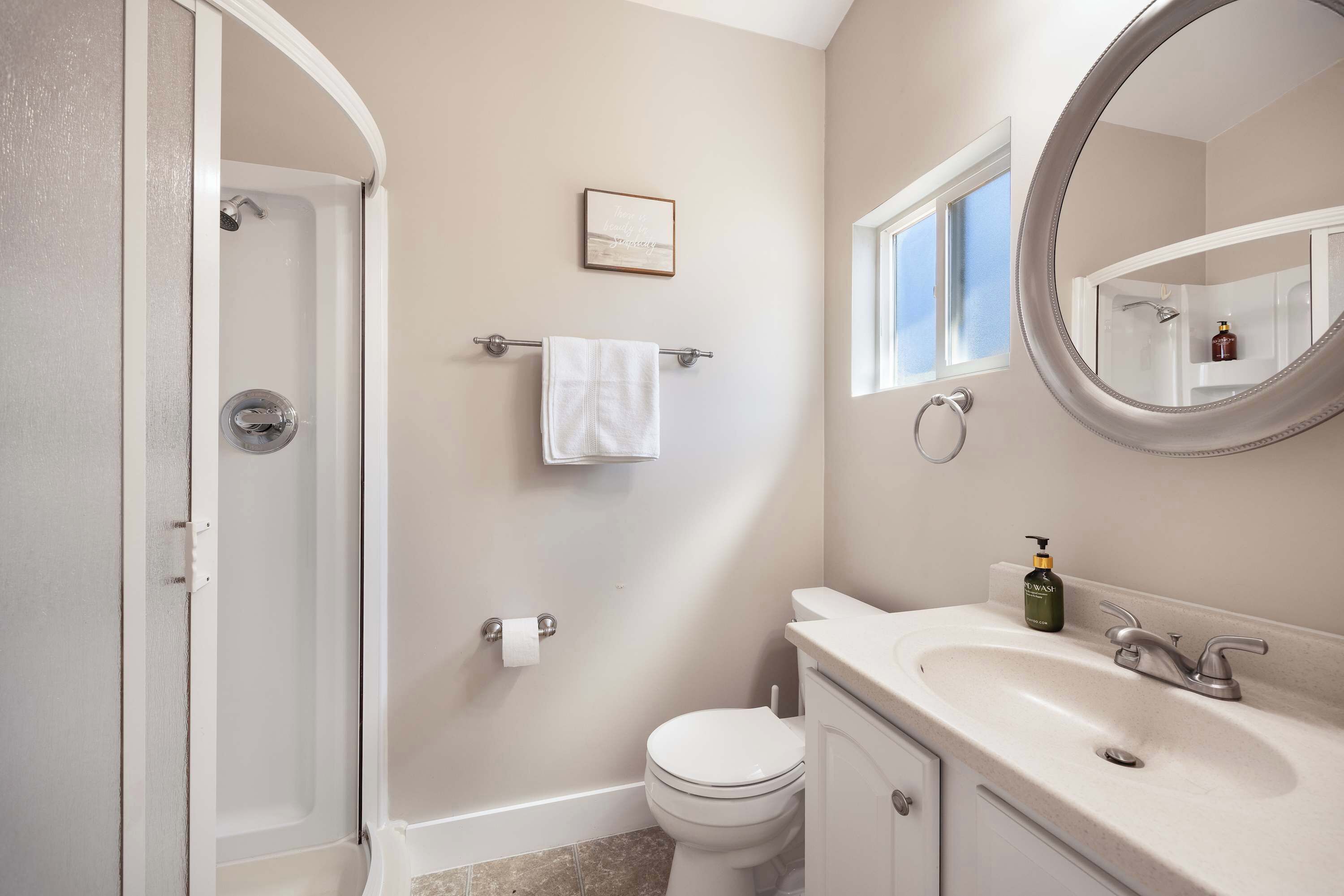 Shower, hair dryer, towels, shampoo