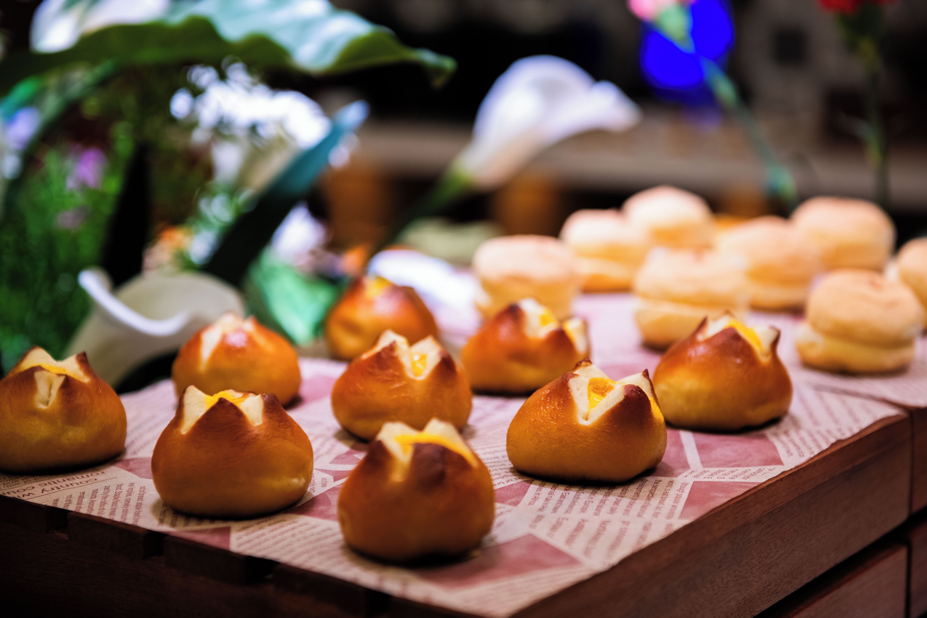 A display of bread rolls on a table.