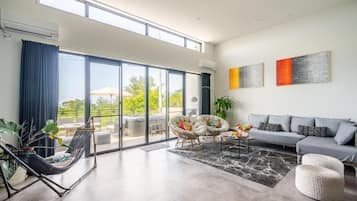 Luxury Villa, Balcony, Beach View | Living area | Flat-screen TV