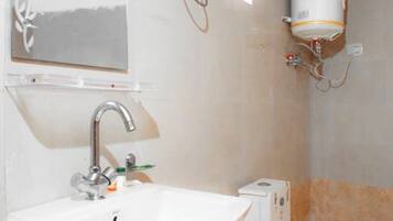 Double Room | Bathroom | Shower, slippers, soap, shampoo