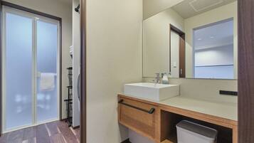 Comfort Condo | Bathroom | Separate tub and shower, free toiletries, hair dryer, slippers