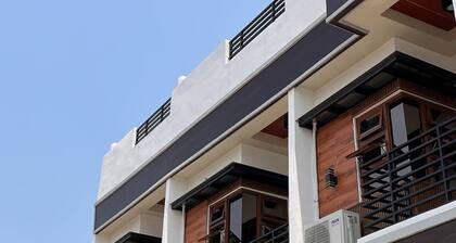 Near The Hundred Islands! Spacious-cozy tropical vibe airconditioned rooms.