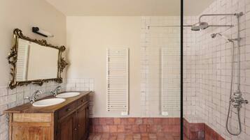 Villa | Bathroom | Bathtub, hair dryer, towels
