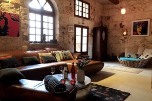 TV, fireplace - Luxury "House of Character" Golden Bay/Manikata. (Mellieha)
