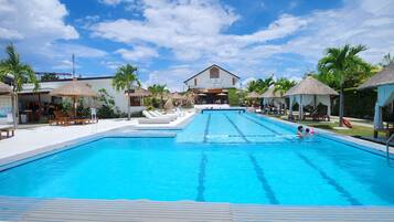 Outdoor pool, pool umbrellas, sun loungers