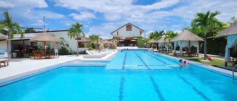 Outdoor pool, pool umbrellas, sun loungers