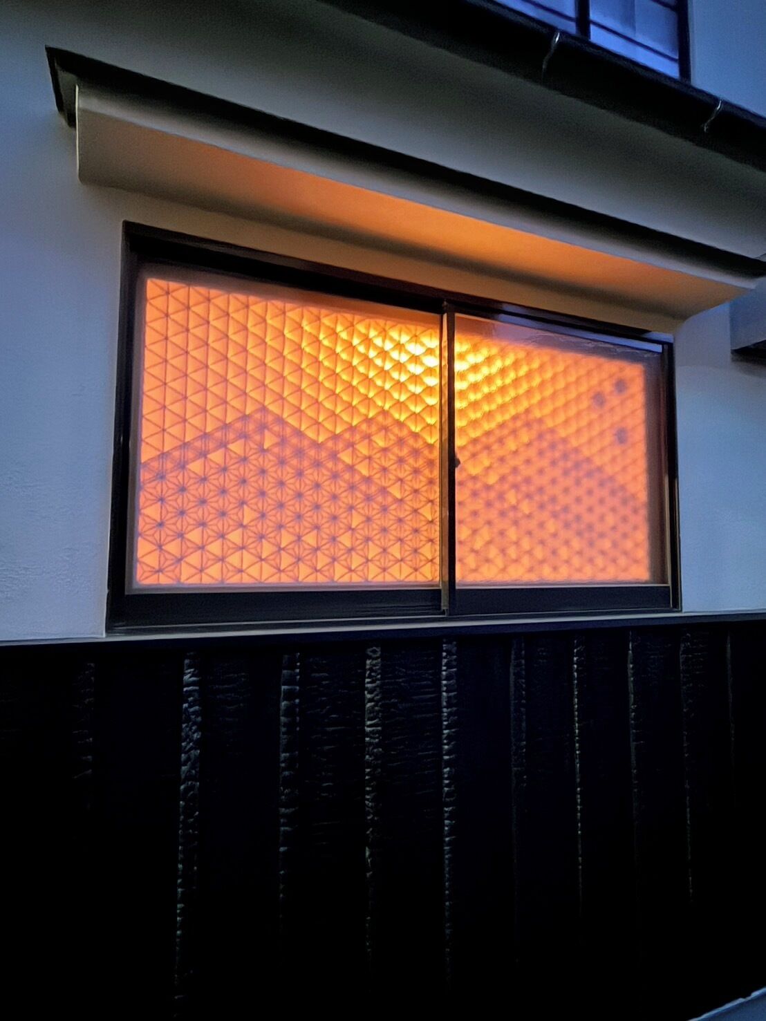 A window with a geometric pattern.