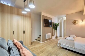1 habitación, tabla de planchar con plancha, wifi y ropa de cama 
